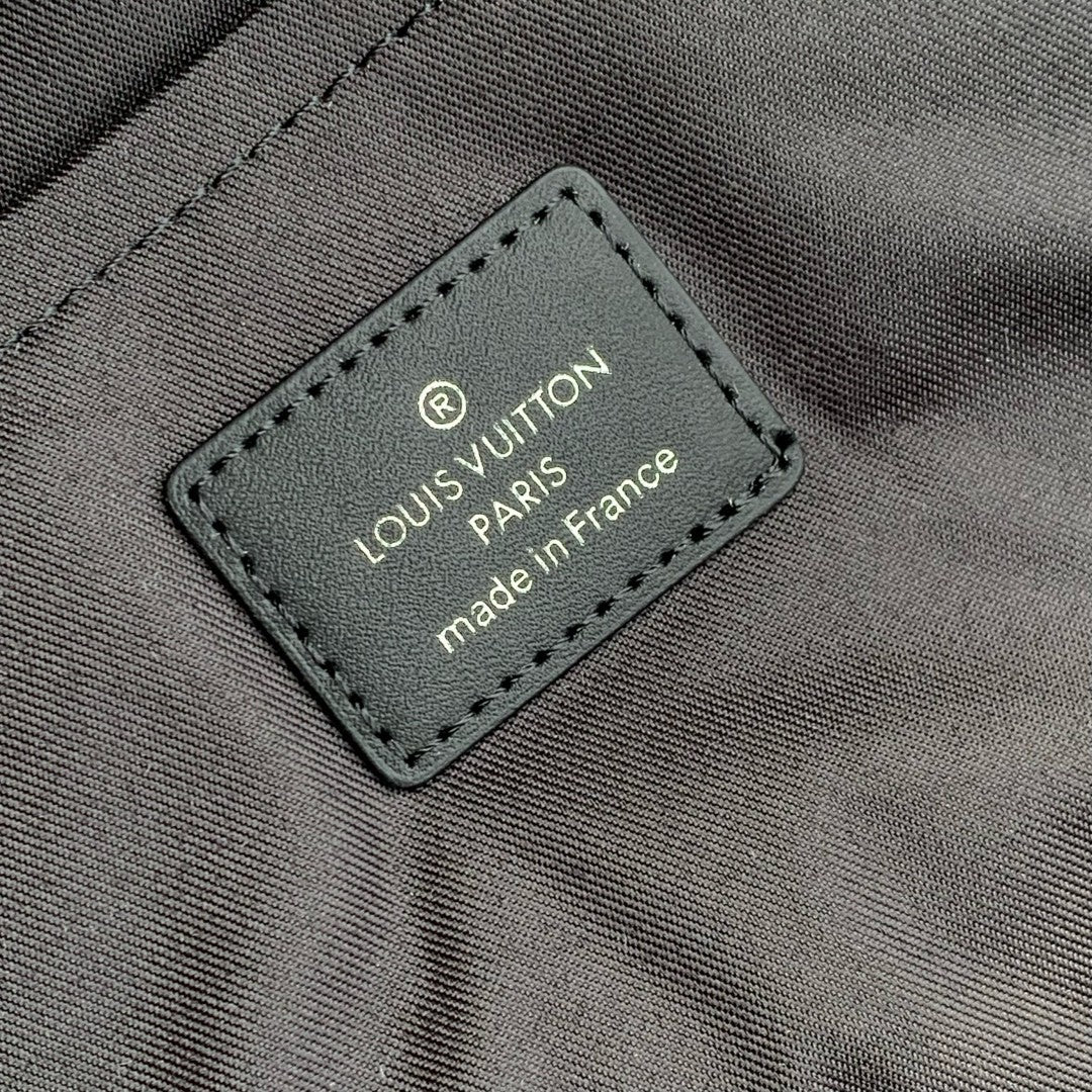 Louis Vuitton interior label reading "made in France" on monogram canvas