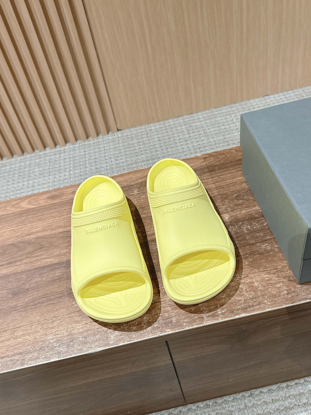 Balenciaga yellow slide sandals with open toe and molded footbed