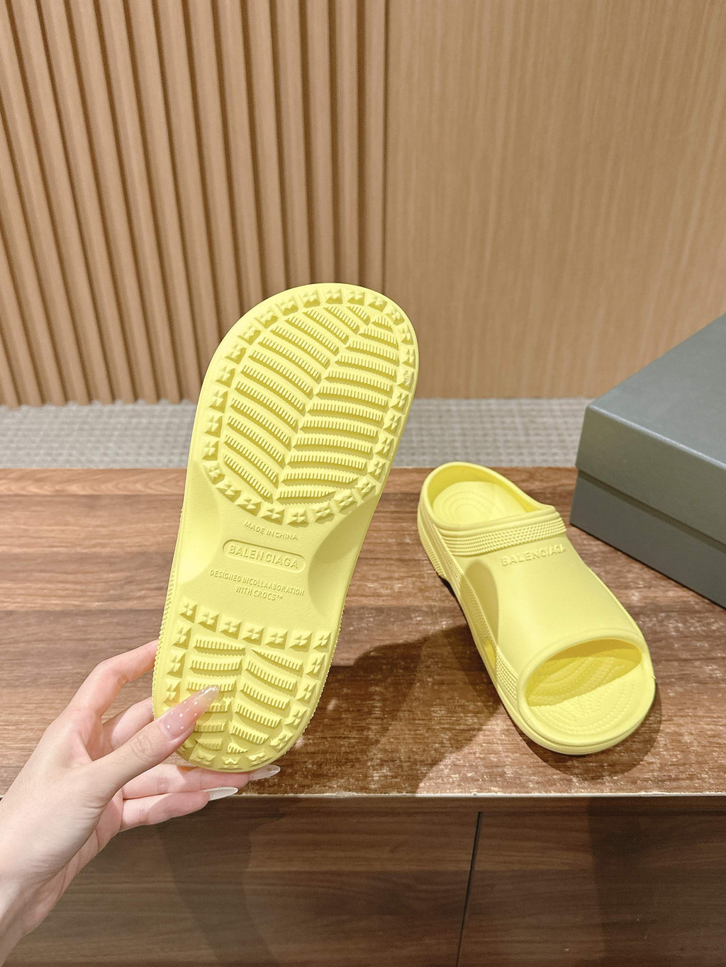 Balenciaga yellow slide sandals showing outsole and footbed details