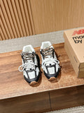 Black and white unisex sneakers with lace-up design and padded tongues
