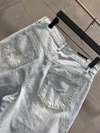 Light-wash denim shorts with patch pockets and buttoned waistband