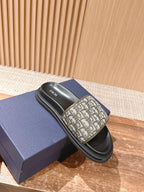 Black Dior slide sandal with beige Oblique wide strap on thick black sole