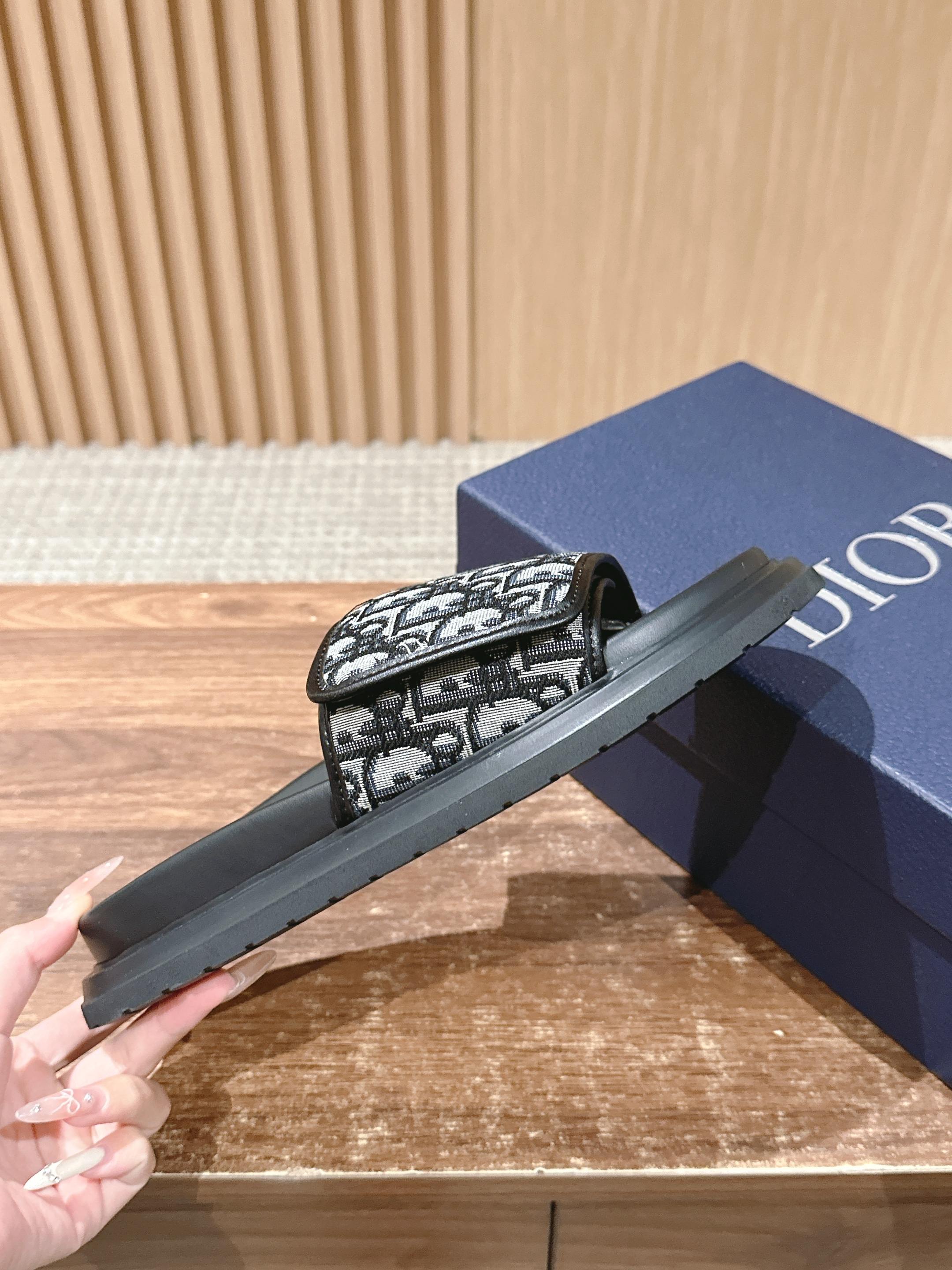 Dior slide sandals outsole side view with Dior monogram strap