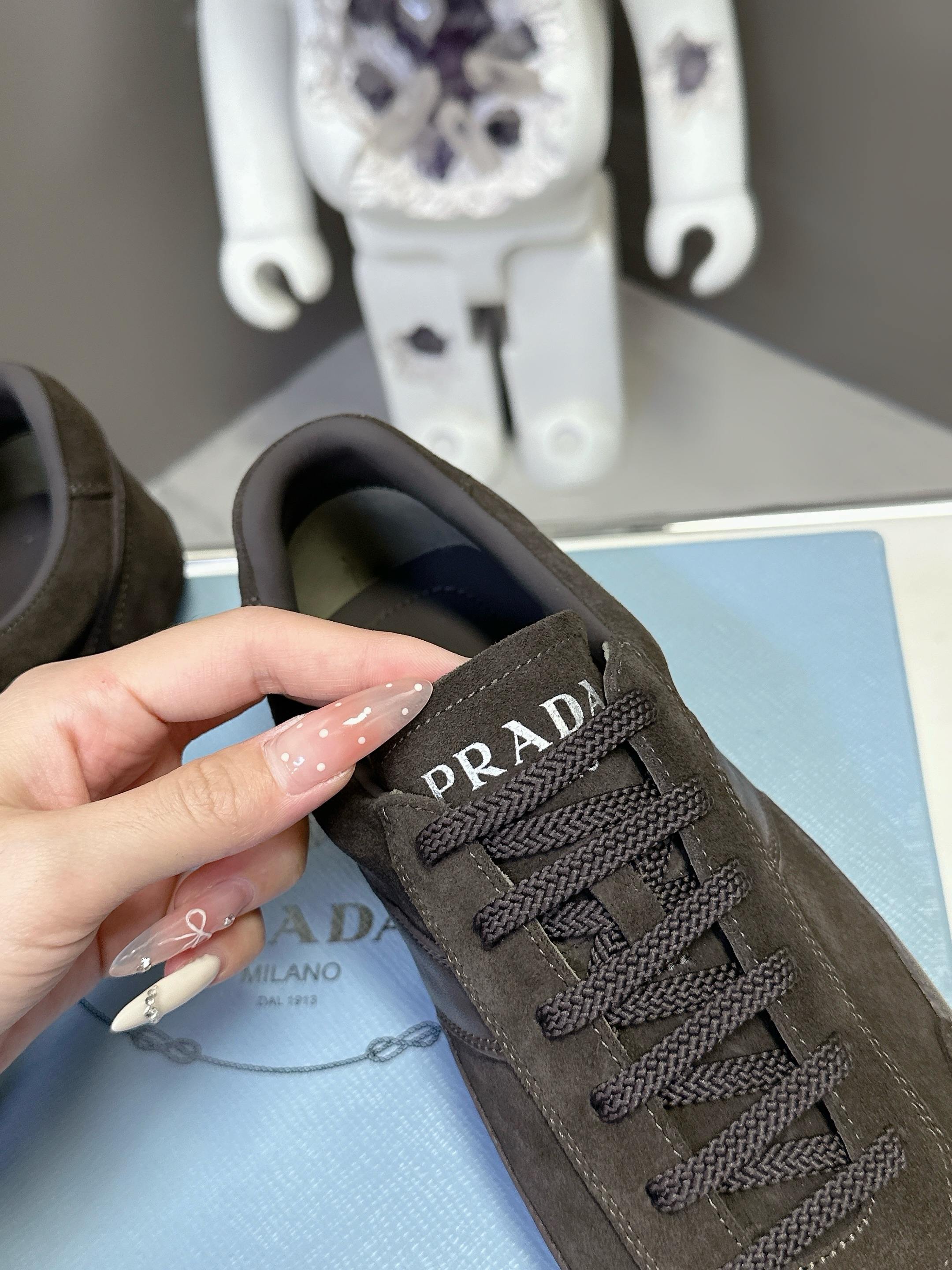 Prada dark brown suede sneaker lace and tongue logo detail