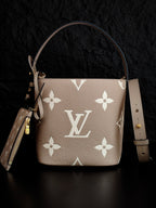 Louis Vuitton monogram bucket bag, light beige leather with white floral print, dual straps