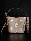 Louis Vuitton monogram bucket bag in light beige with white floral pattern, top handles