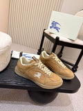 Tan suede sneakers with white laces and white horse logo, low profile sole
