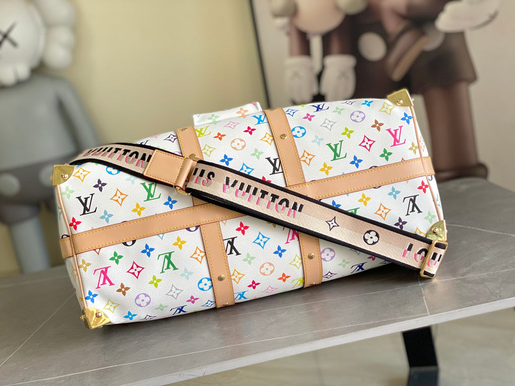 Men's Louis Vuitton duffel bag with tan crossbody strap and multicolor monogram