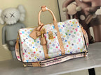 Men's Louis Vuitton duffel bag with multicolor print and tan handles