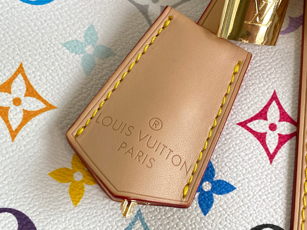 Louis Vuitton logo leather patch with stitched edge on multicolor monogram canvas