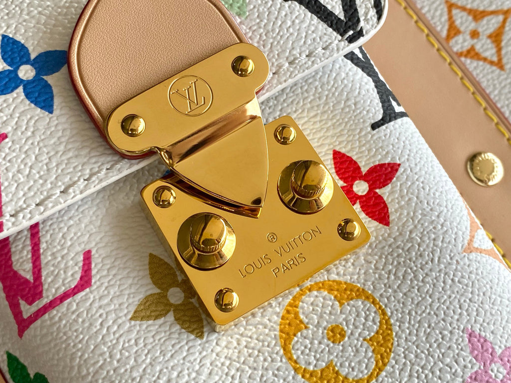 Men's Louis Vuitton monogram bag with gold clasp hardware and multicolor background