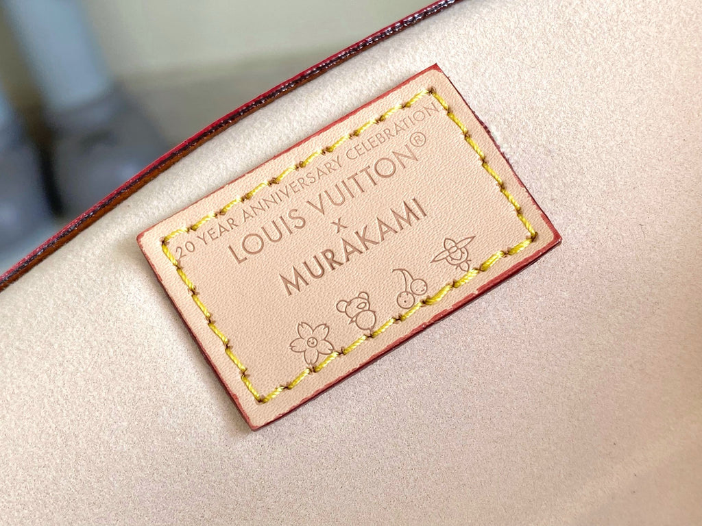 Louis Vuitton bag leather tag with anniversary logo and floral print