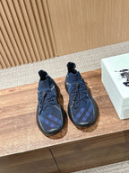 Burberry blue knit lace-up sneakers with check pattern and black rubber sole