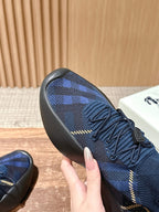 Burberry blue check knit upper with laces, stitched trim, and rubber toe cap