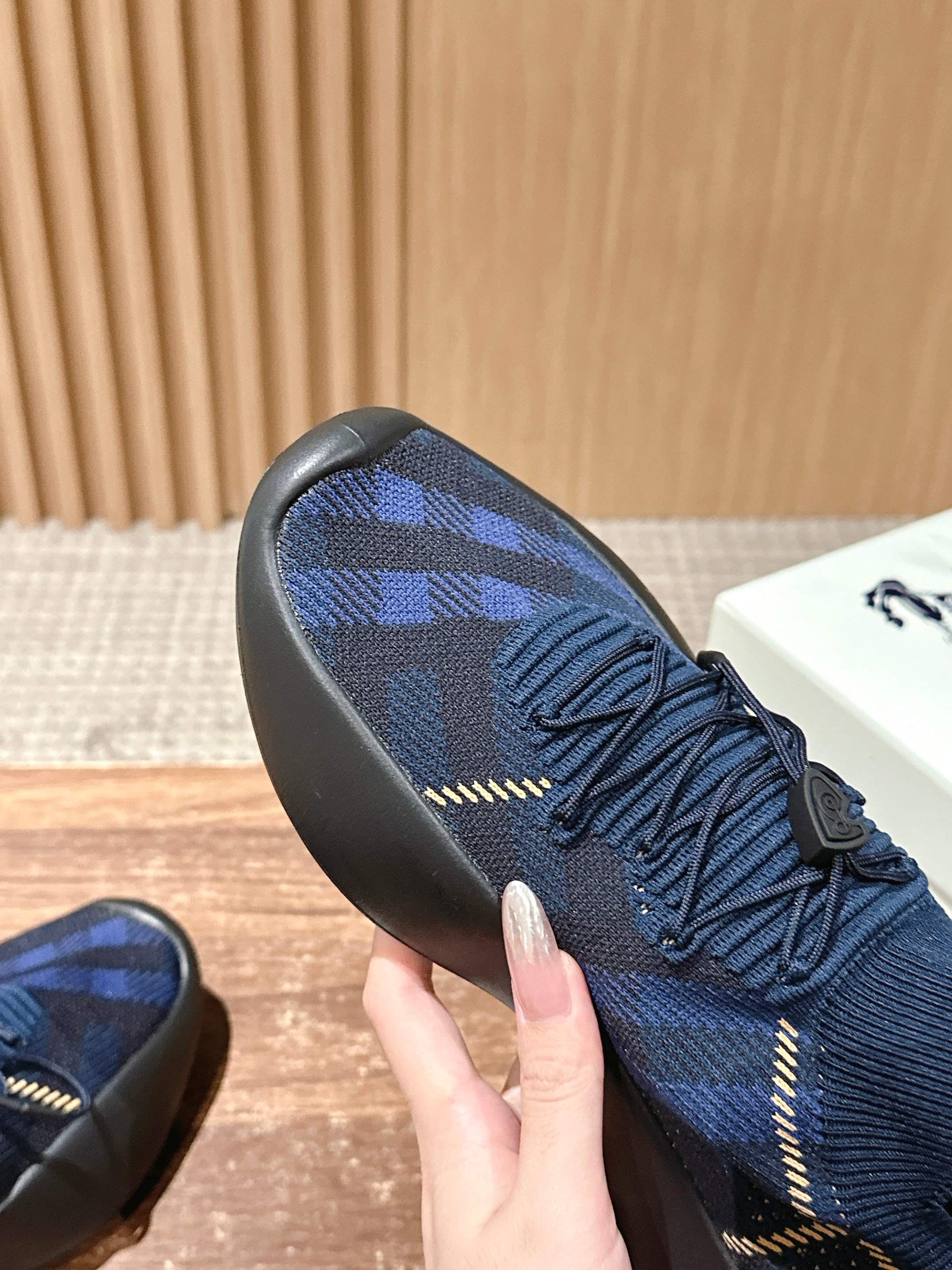 Burberry blue check knit upper with laces, stitched trim, and rubber toe cap