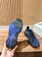 Burberry blue check sneaker outsole with deep tread and dark rubber heel edge
