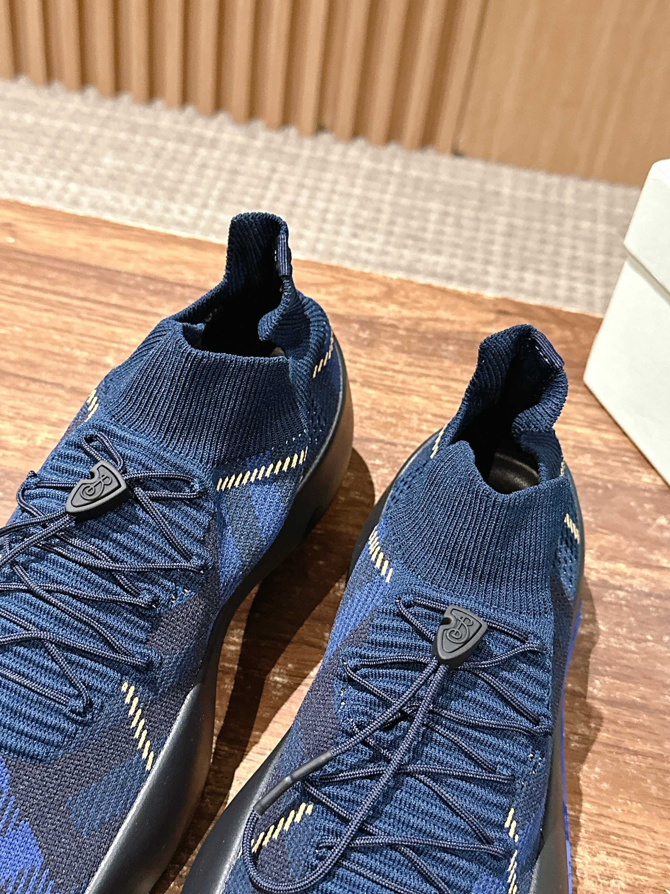 Burberry blue check knit sneakers with lace-up front and small shield-style side patch
