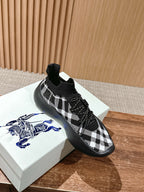 Black and white check knit sneaker with lace-up front and sock collar