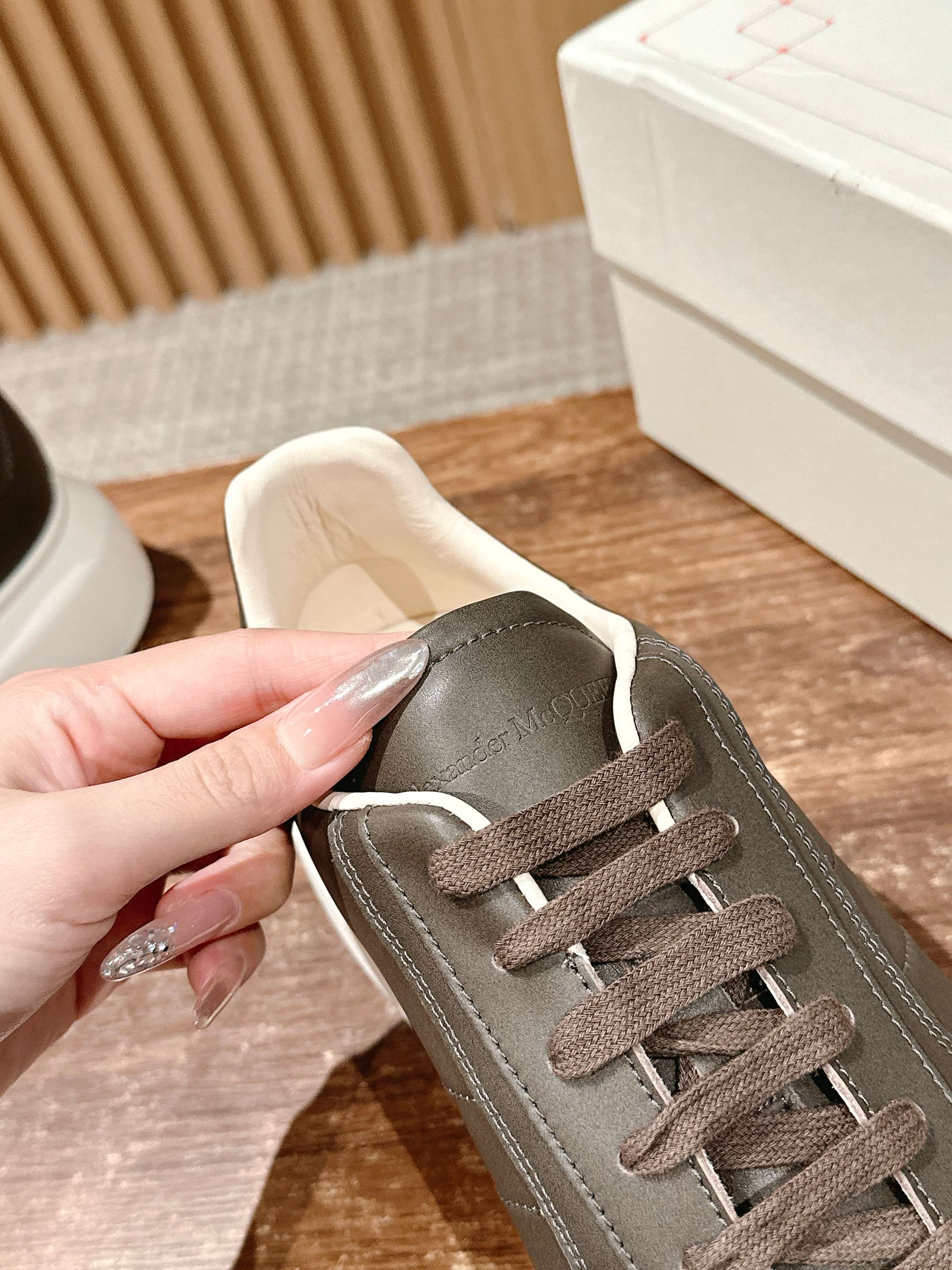 Leather sneaker upper, dark taupe with brown lace-up eyelets and padded collar