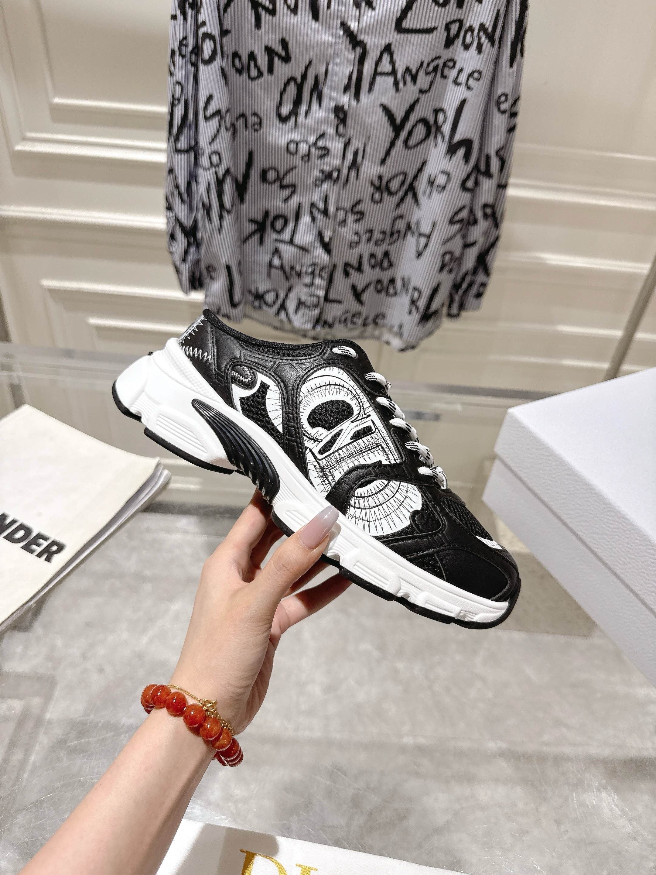 Dior black and white lace-up sneakers with chunky sole