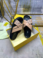 Fendi sandals in beige with FF-logo straps and thick black base