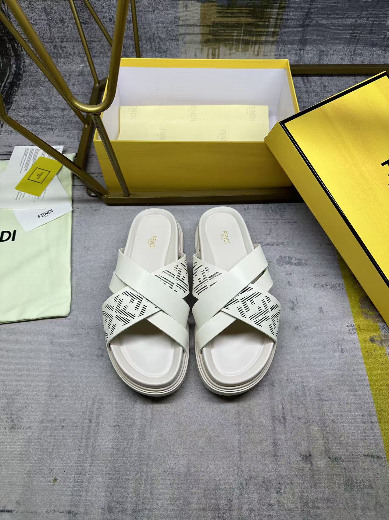 Fendi white slide sandals, front pair, double straps with FF pattern
