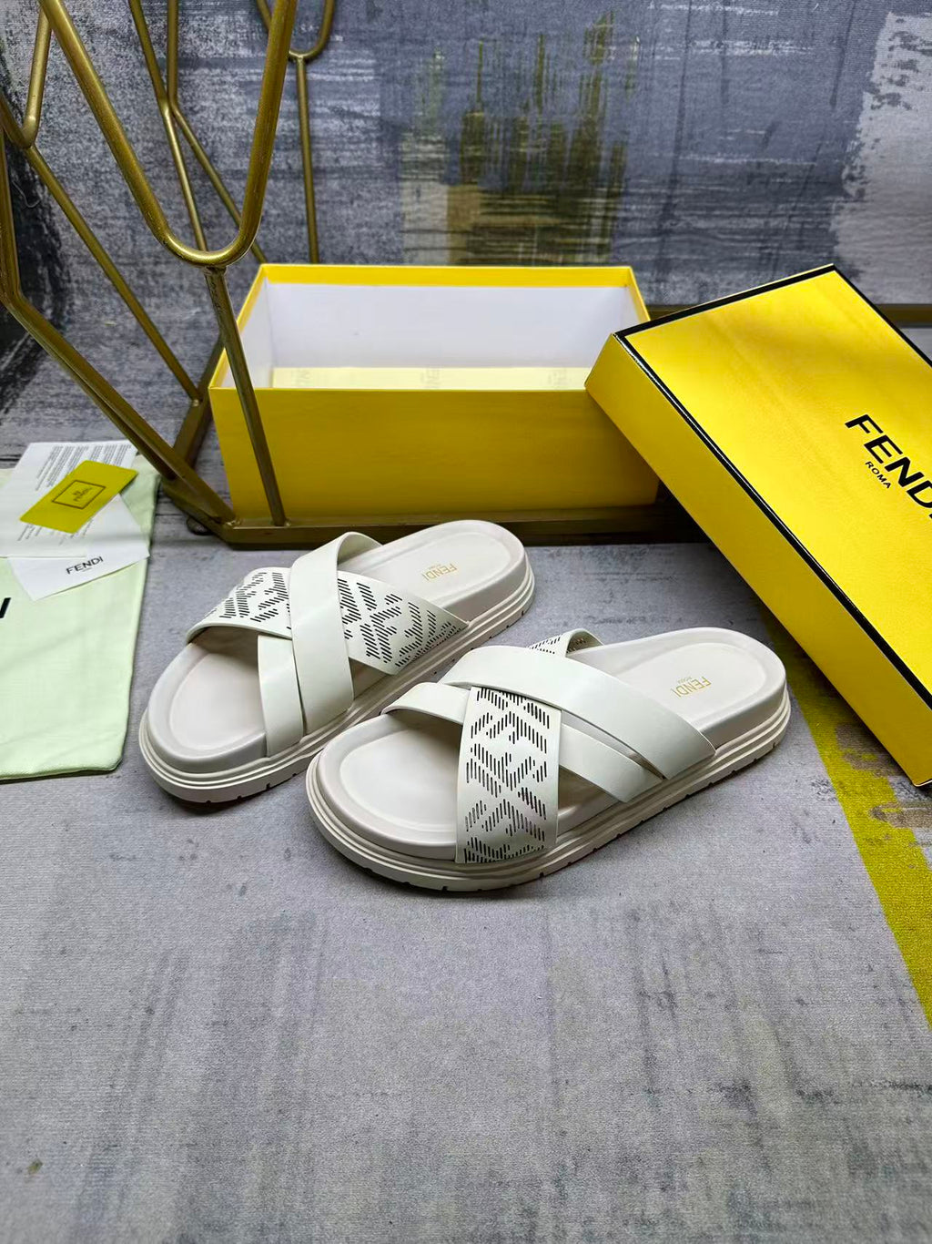 Fendi white slide sandals, side view, double strap with FF pattern