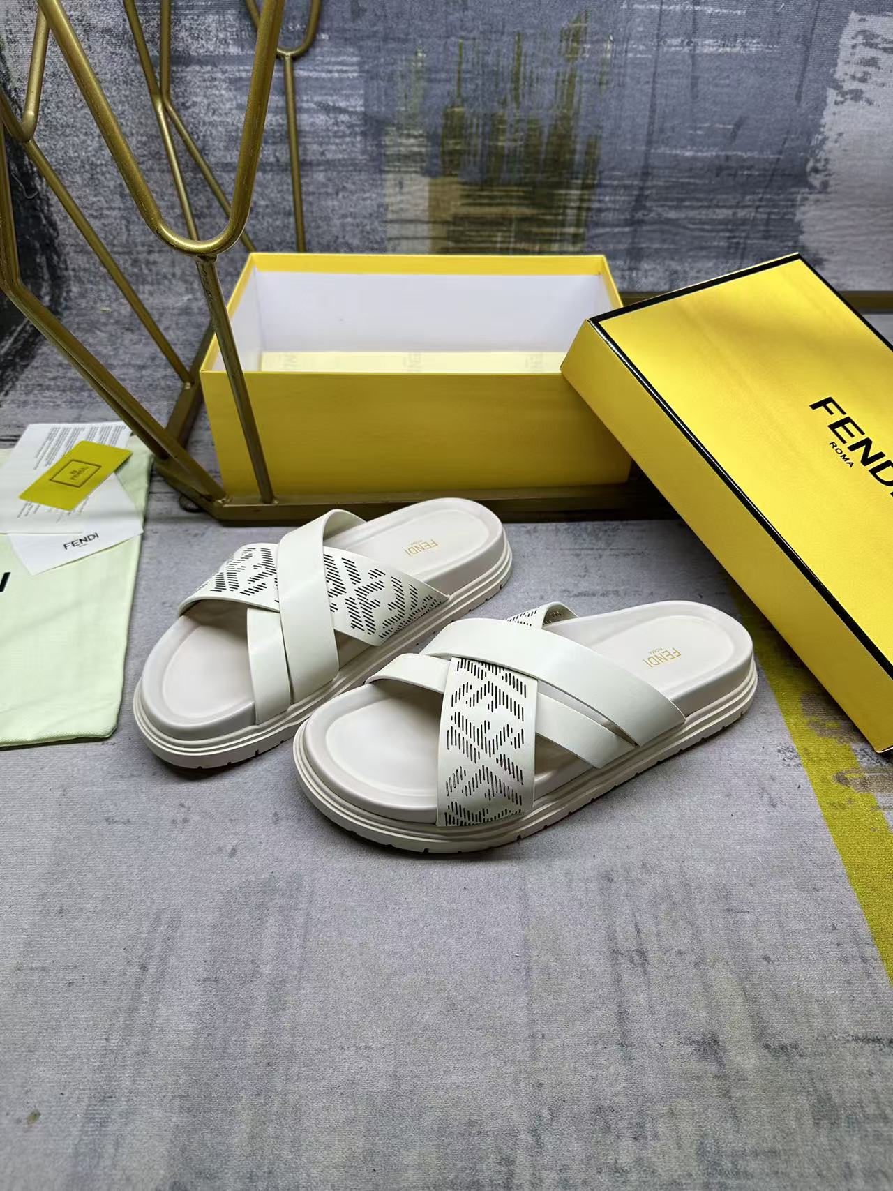 Fendi white slide sandals, side view, double strap with FF pattern