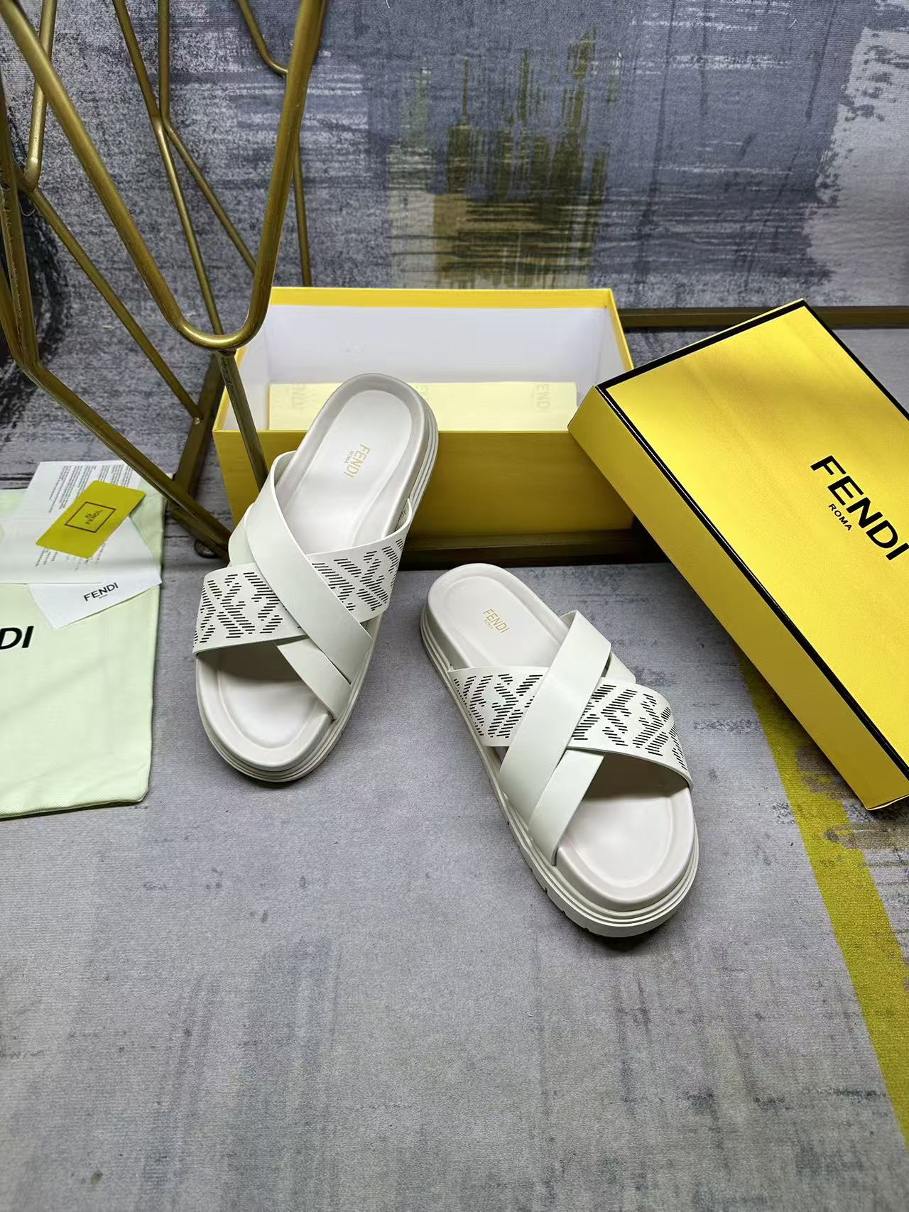 Fendi white slide sandals with double straps and FF logo panel