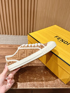 Fendi unisex sneakers held up, brown monogram upper with white rubber sole