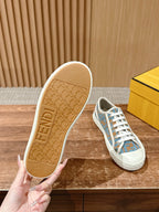 Fendi sneaker outsole and heel, tan tread with blue logo upper and white laces