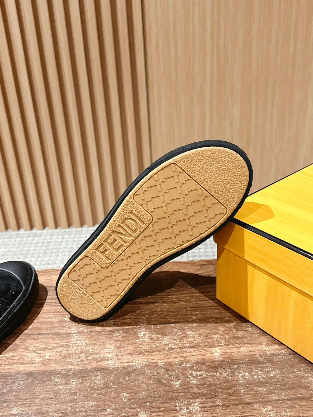 Fendi unisex sneaker outsole close-up with FENDI logo on tread