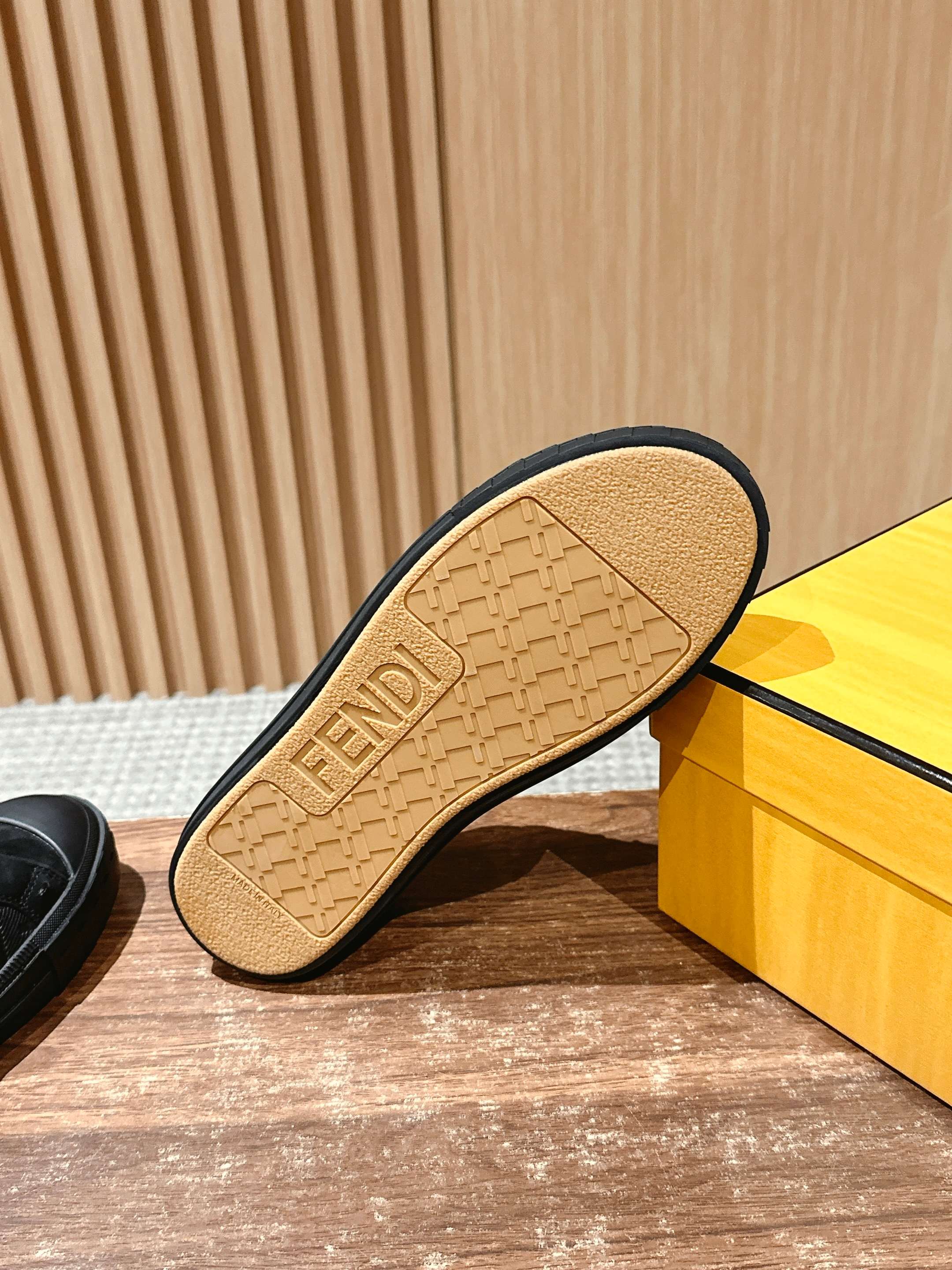 Fendi unisex sneaker outsole close-up with FENDI logo on tread