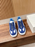 Alexander McQueen low-top sneakers, blue suede uppers with white toe and side panels