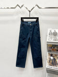 Dark blue denim cargo pants with belt loops and gold button details
