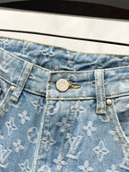 Light blue denim jeans waistband with button closure and monogram pattern