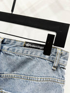 Light blue denim waistband with brand logo patch and belt loops