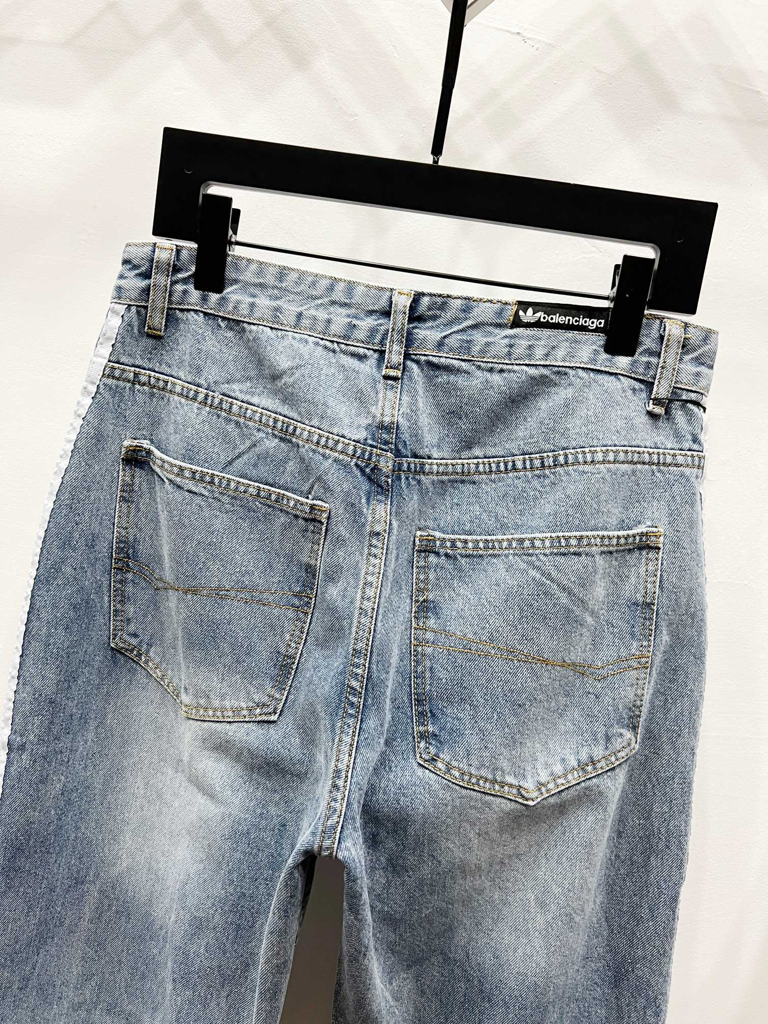 Light blue denim pants with two front patch pockets and belt loops