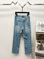 Blue denim pants with all-over logo print, zip fly, front pockets, and belt loops