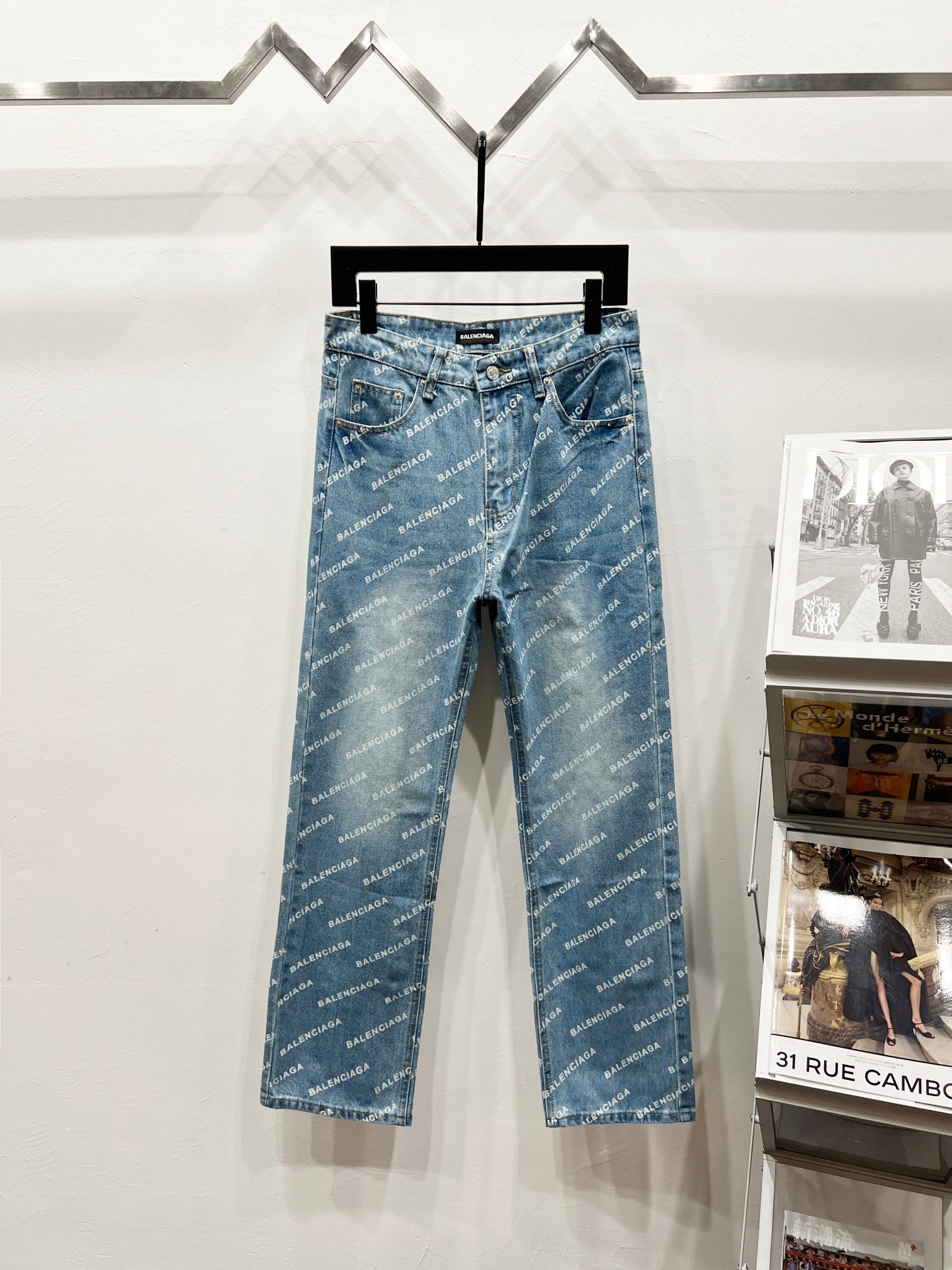 Blue denim pants with all-over logo print, straight leg, front pockets and belt loops