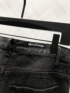 Black denim pants waistband with balenciaga logo patch and belt loops