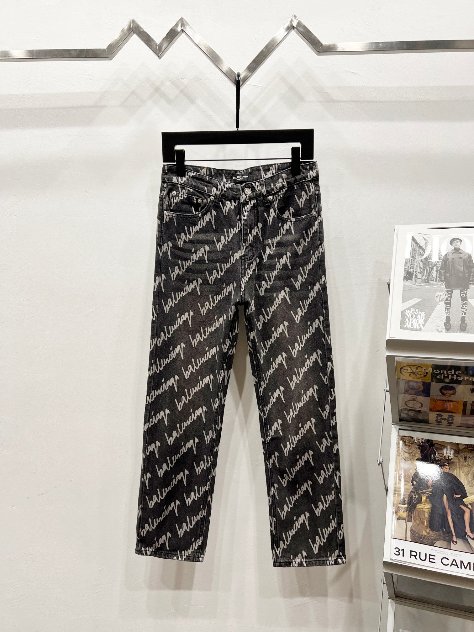 Black denim jeans with allover Balenciaga script print, cropped straight-leg fit