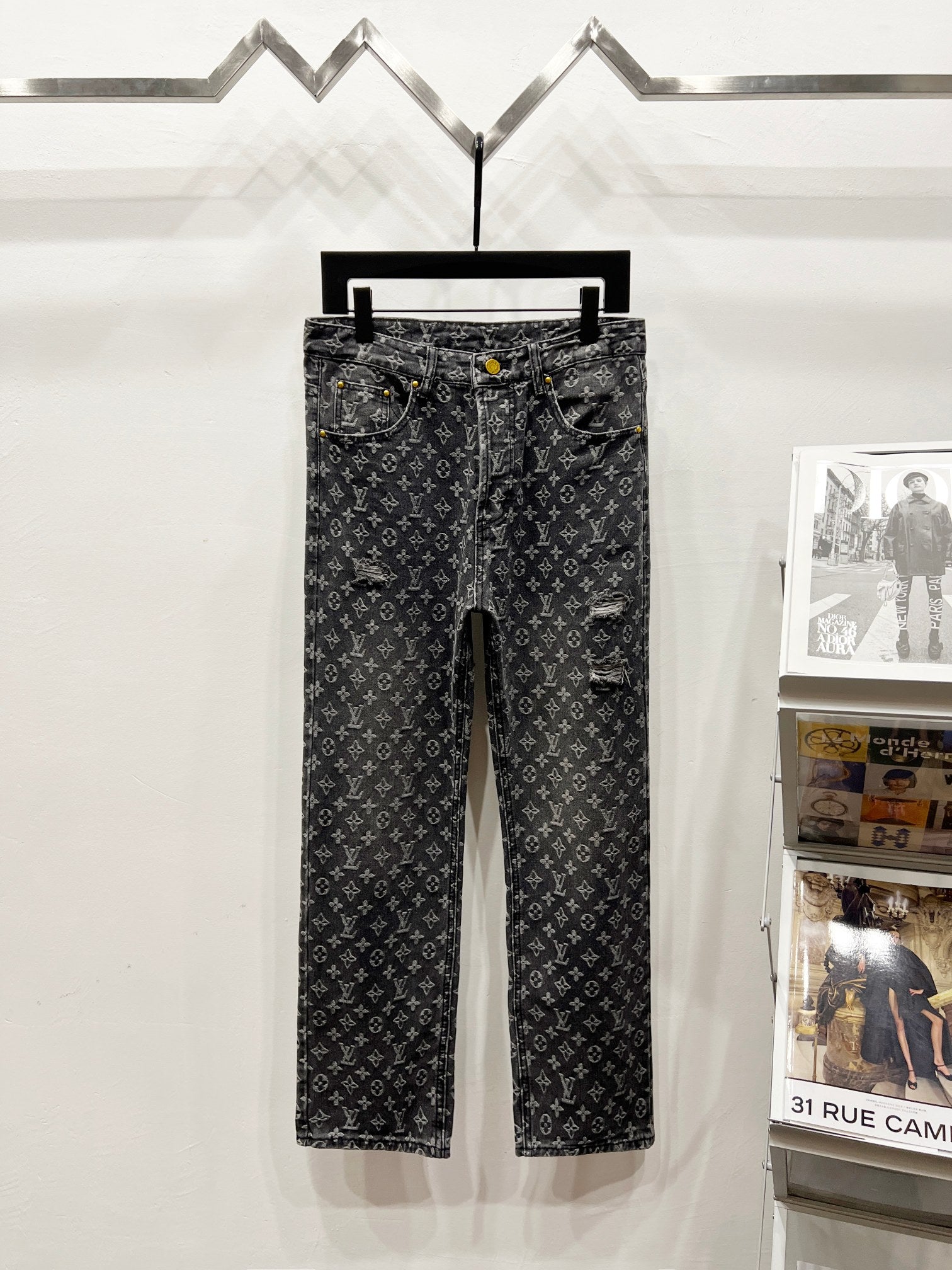 Louis Vuitton monogram dark jeans pants, front view on hanger