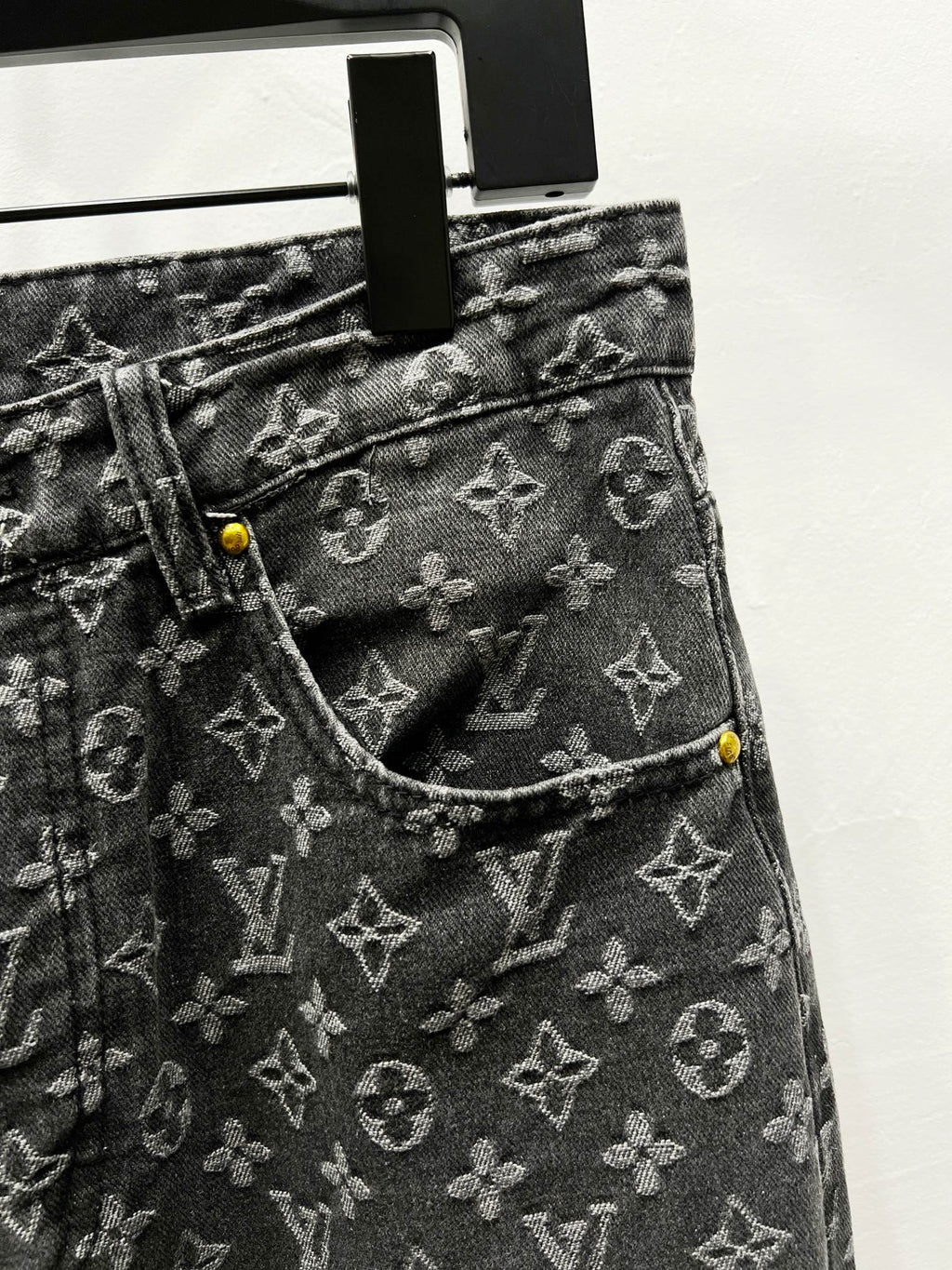 Louis Vuitton monogram denim jeans with front pocket seam and yellow button