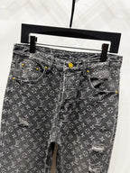 Louis Vuitton monogram denim jeans with distressing, front view