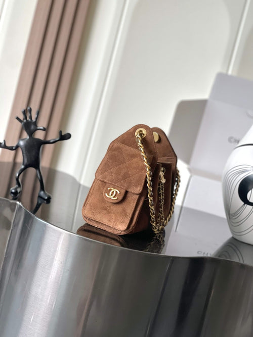 Tan-brown suede mini shoulder bag with gold chain strap and front flap