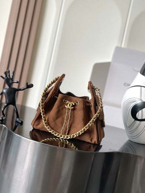 Chanel suede shoulder bag in tan-brown with gold chain strap and flap closure