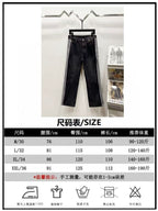 Black denim pants on hanger with size chart overlay and measurement table