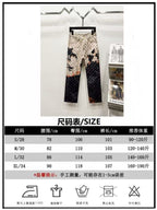 Louis Vuitton trousers size chart with measurements S to XL and care icons