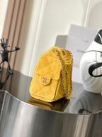 Chanel quilted mini shoulder bag, yellow suede texture, chain strap and flap